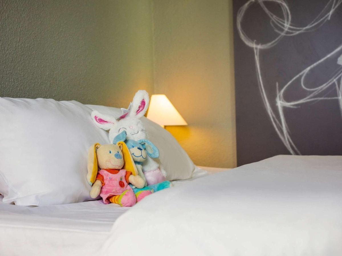 Отель Ibis Mulhouse Ile Napoleon Сошем Экстерьер фото